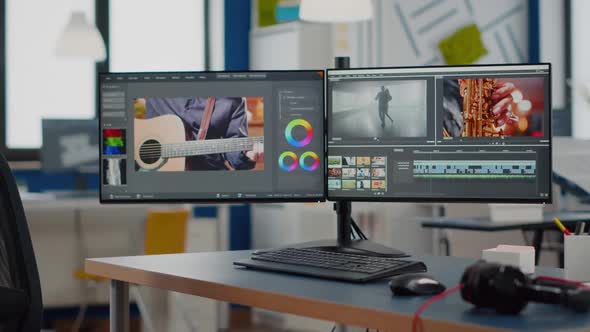 Video Production Studio with Nobody in It and Computer with Two Displays alt