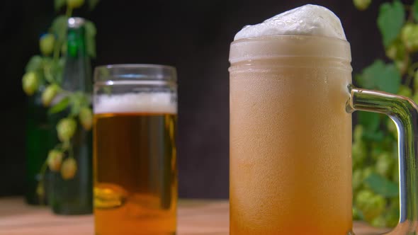 Pouring Beer Mug with Huge Foam Head alt