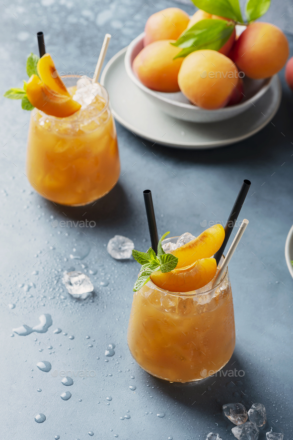 Fresh apricot cocktail with ice and mint