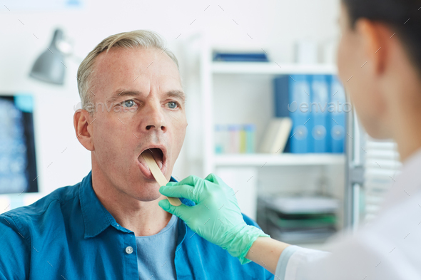 Mature Patient Opening Mouth