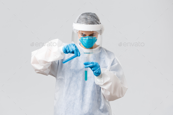 Covid-19, medical research, healthcare workers and quarantine concept. Tech lab doctor in clinic - Stock Photo - Images