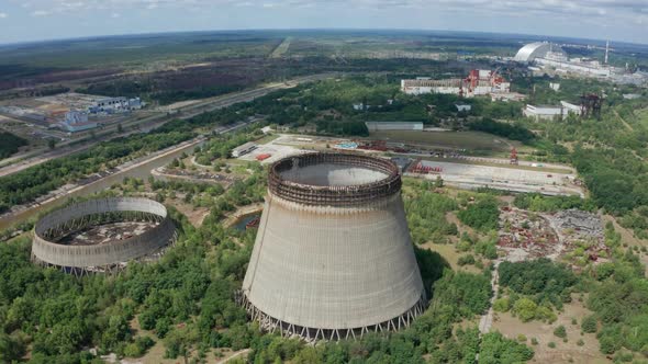 Drone Flight Over Cooling Towers Near Power Plant alt