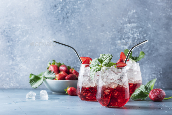 Red cocktail with ice and fresh strawberry - Stock Photo - Images