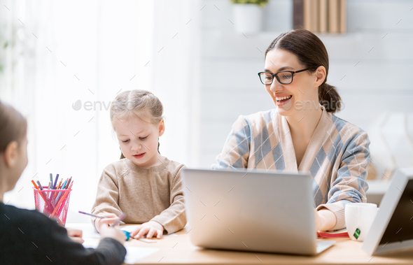 mother with children working on the computer
