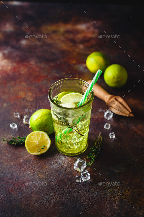 Lime Lemonade with thyme and ice. - Stock Photo - Images