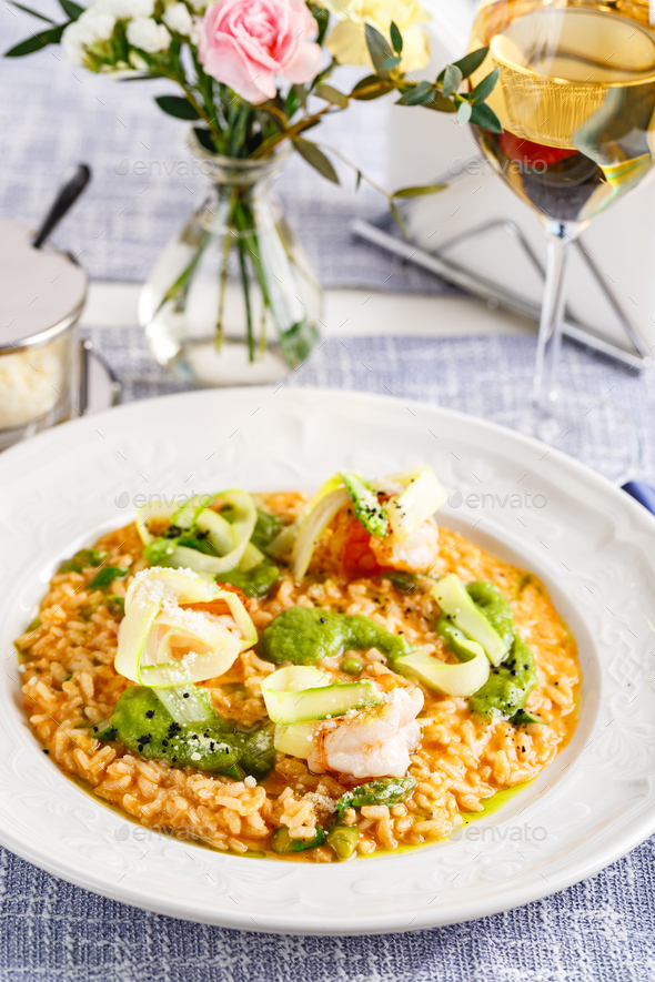 Italian risotto with asparagus and shrimp Stock Photo by Irrin PhotoDune