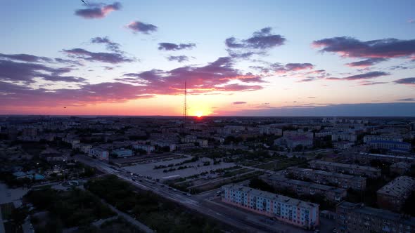 Pink Sunset Over a Small Town alt