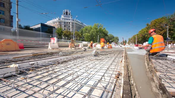 Concrete Works for Road Construction with Many Workers and Mixer Timelapse Hyperlapse alt