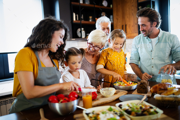 Portrait of happy family in kitchen at home