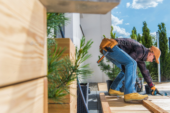 Wooden Garden Porch Building by Caucasian Men - Stock Photo - Images