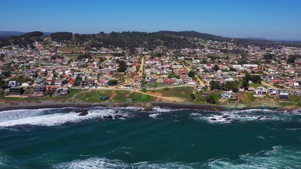 Pichilemu infiernillo Beach, Drone Shot, midday, aerial view city pichilemu and beach  alt