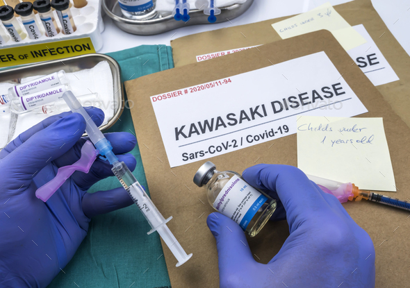 Nurse injects methylprednisolone to treat Sars-CoV-2-related Kawasaki disease - Stock Photo - Images