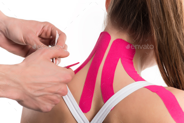 Rear view hands stick pink stripes - Stock Photo - Images