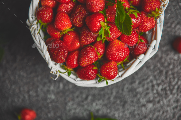 Strawberries in white basket. Fresh strawberries. Beautiful strawberries. - Stock Photo - Images