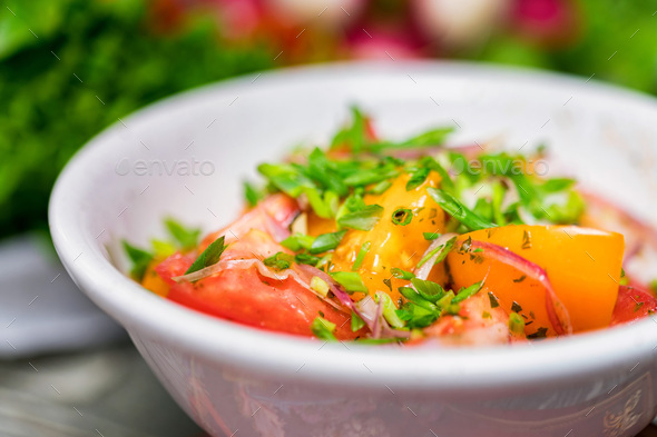Fresh rustic vegetable salad on rustic background - Stock Photo - Images