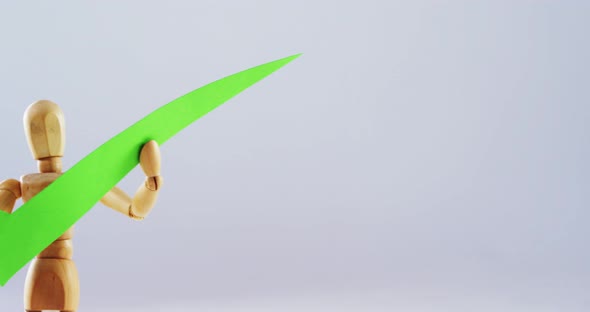 Figurine holding correct sign alt