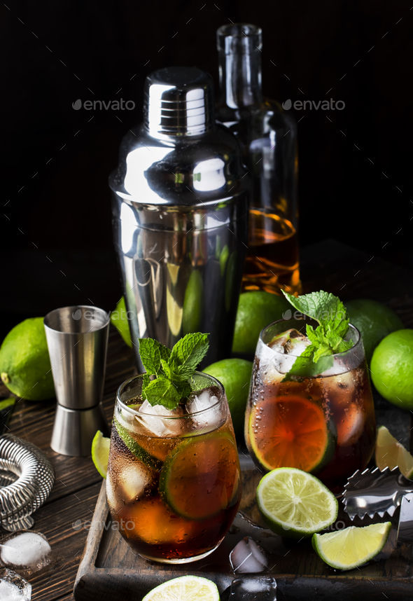 Download Cuba Libre Or Rum Cola Cocktail With Strong Alcohol Lemon Juice Lime And Ice Stock Photo By 5ph