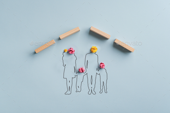 Silhouetted family under a roof made of wooden pegs