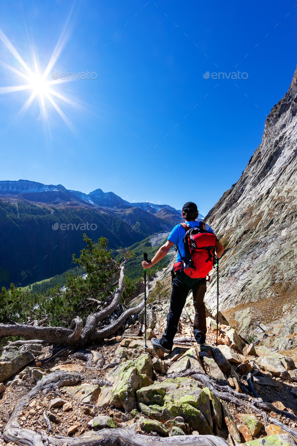 Hiker takes aama. Mont Blanc Massif rest - Stock Photo - Images