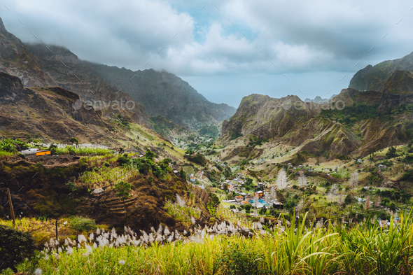 Gorgeous panorama view of a fertile Paul valley. Agriculture terraces in vertical valley sides - Stock Photo - Images