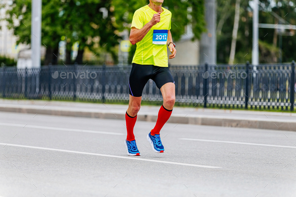 man runner athlete in compression socks