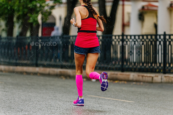 girl runner in compression socks run