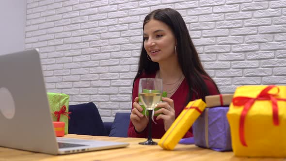 Attractive Woman Gives a Gift Online By Video Chat on Quarantine Self Isolation