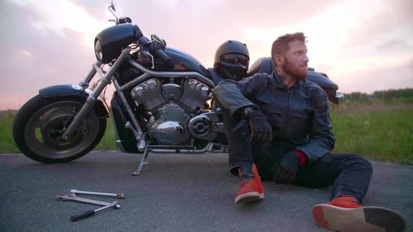 The Biker's Motorcycle Broke Down He Sits and Waits for Help