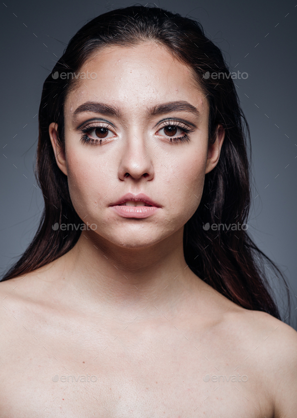Smooth hair woman long hair brunette over dark background