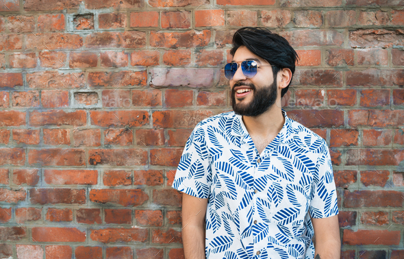 Handsome man in summer outfit wear sunglasses Stock Photo