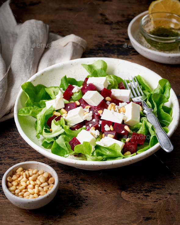 Healthy salad with beet, curd, feta and pine nuts, lettuce. Low carb keto ketogenic dash diet