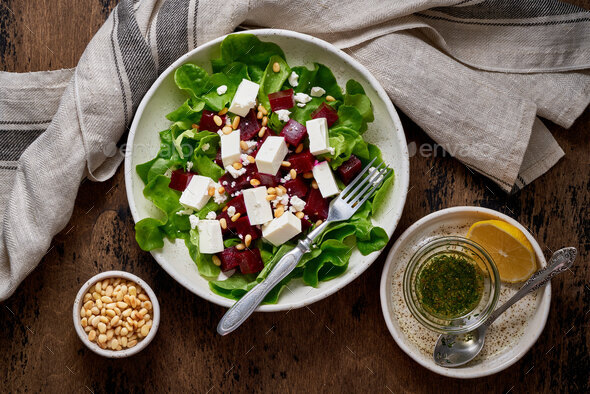 Healthy salad with beet, curd, feta and pine nuts, lettuce. Low carb keto ketogenic dash diet