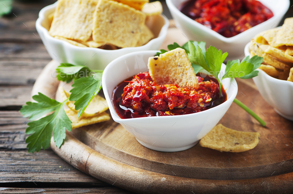 Mexican hot salsa with chili peppers Stock Photo by OxanaDenezhkina