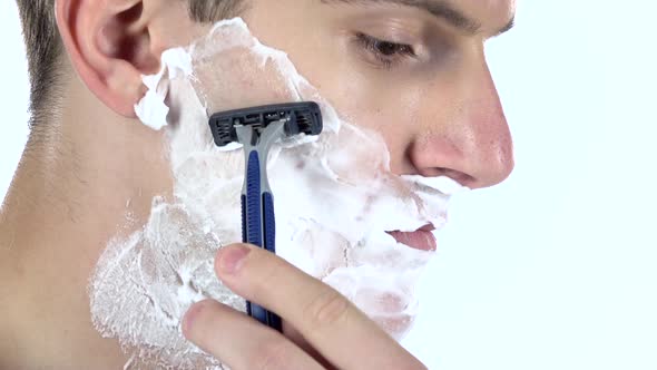Man Shaving As Part of His Morning Routine. Slow Motion alt