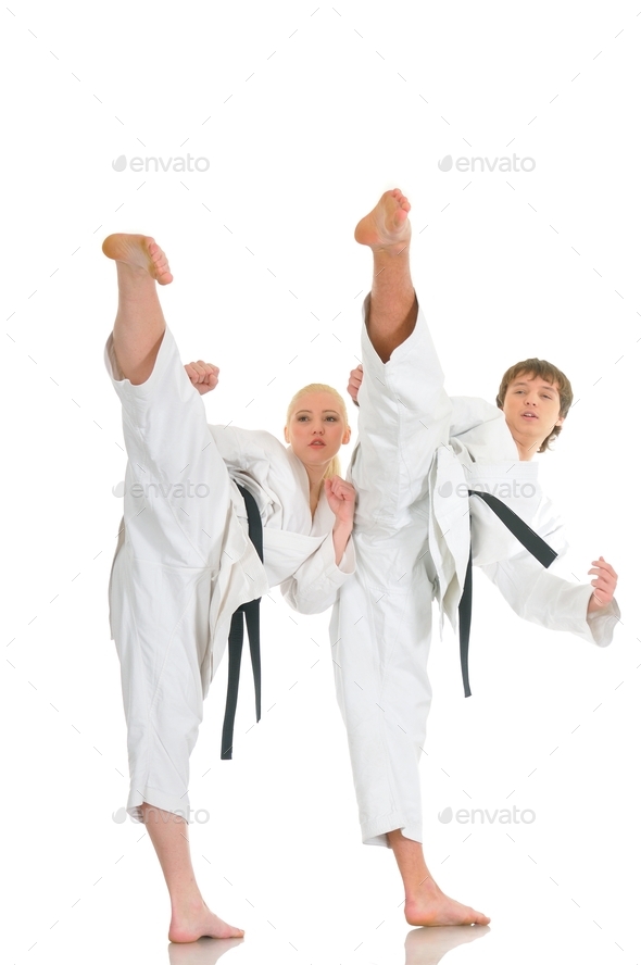 Strong young blonde girl and the saucy karate guy