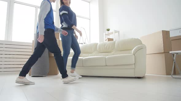 Young Mom and Son Are Moving To a New Apartment alt