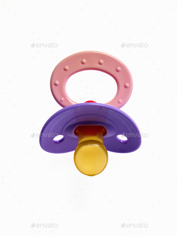 A coloured plastic baby pacifier, dummy or soother.