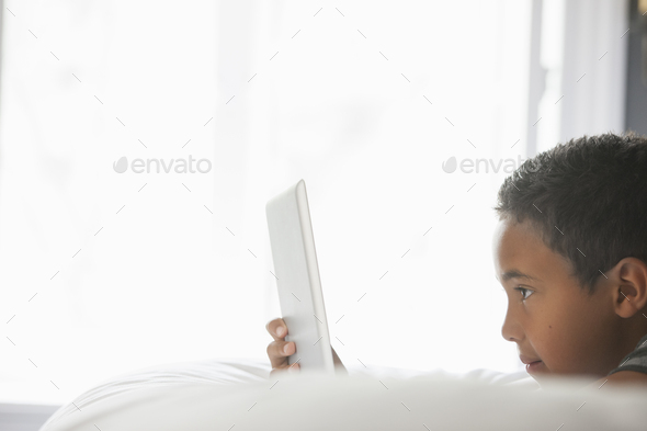 Boy using a tablet.