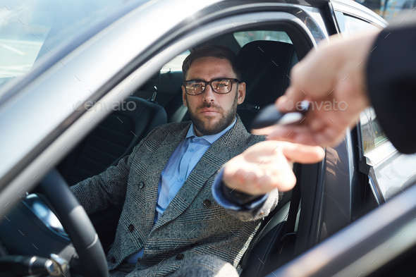 Man renting the car - Stock Photo - Images