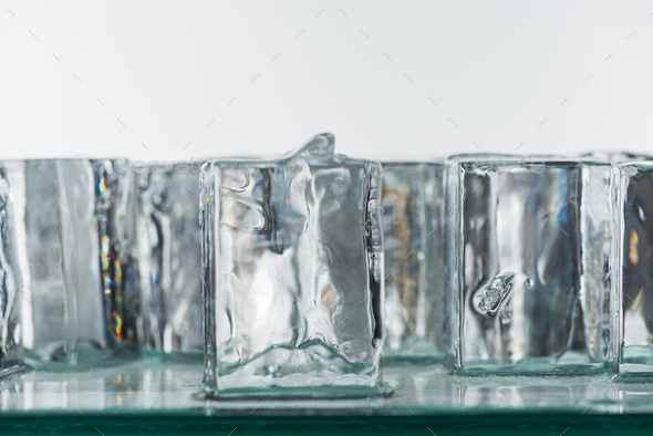 Glass With Ice Cubes. Isolated On White Stock Photo, Picture and