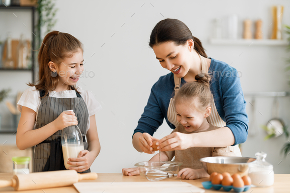 family are preparing bakery together - Stock Photo - Images