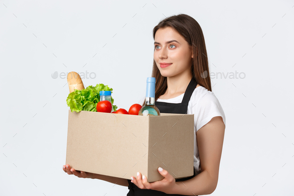 Employees, delivery and online orders, grocery stores concept. Profile of nice cute saleswoman