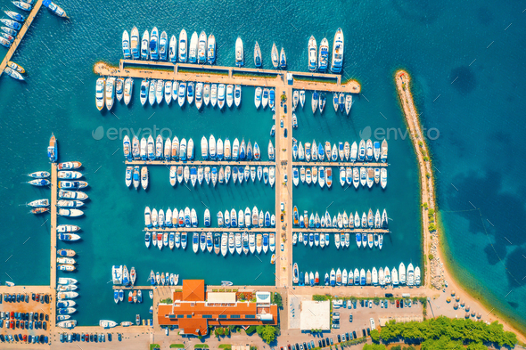Aerial view of boats and yachts in port in old city at sunset - Stock Photo - Images