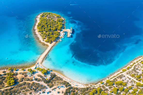 Aerial view of beutiful small island in sea bay at sunny day - Stock Photo - Images