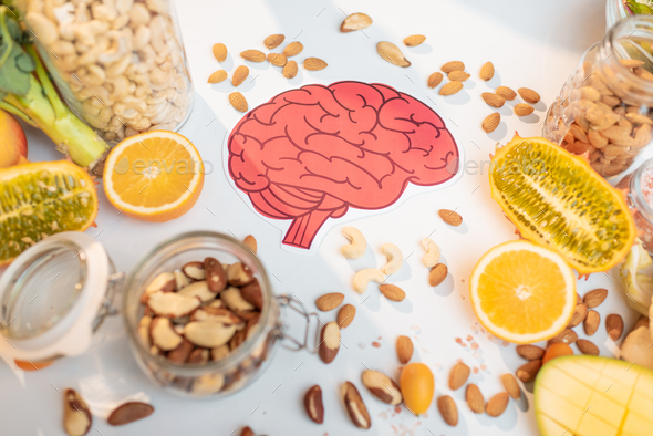 Human brain drawing and healthy fresh food on the table