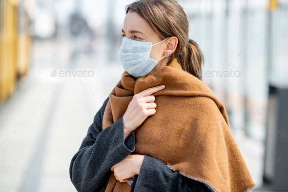 Woman with face mask during epidemic outdoors