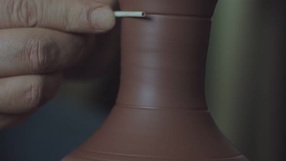 Shaping Clay Pitcher