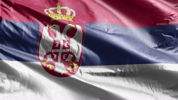 Serbia textile flag waving on the wind. 10 seconds loop.  alt
