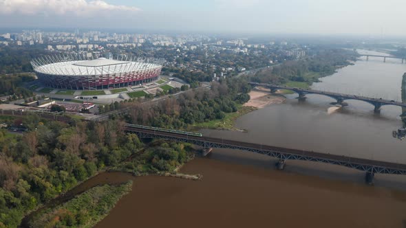 Slide and Pan Footage of Modern National Stadium on Vistula Riverbank alt