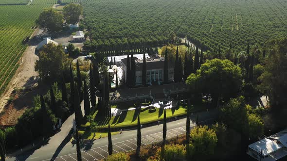 High orbit aerial of Grand Island Mansion wedding venue near Sacramento alt